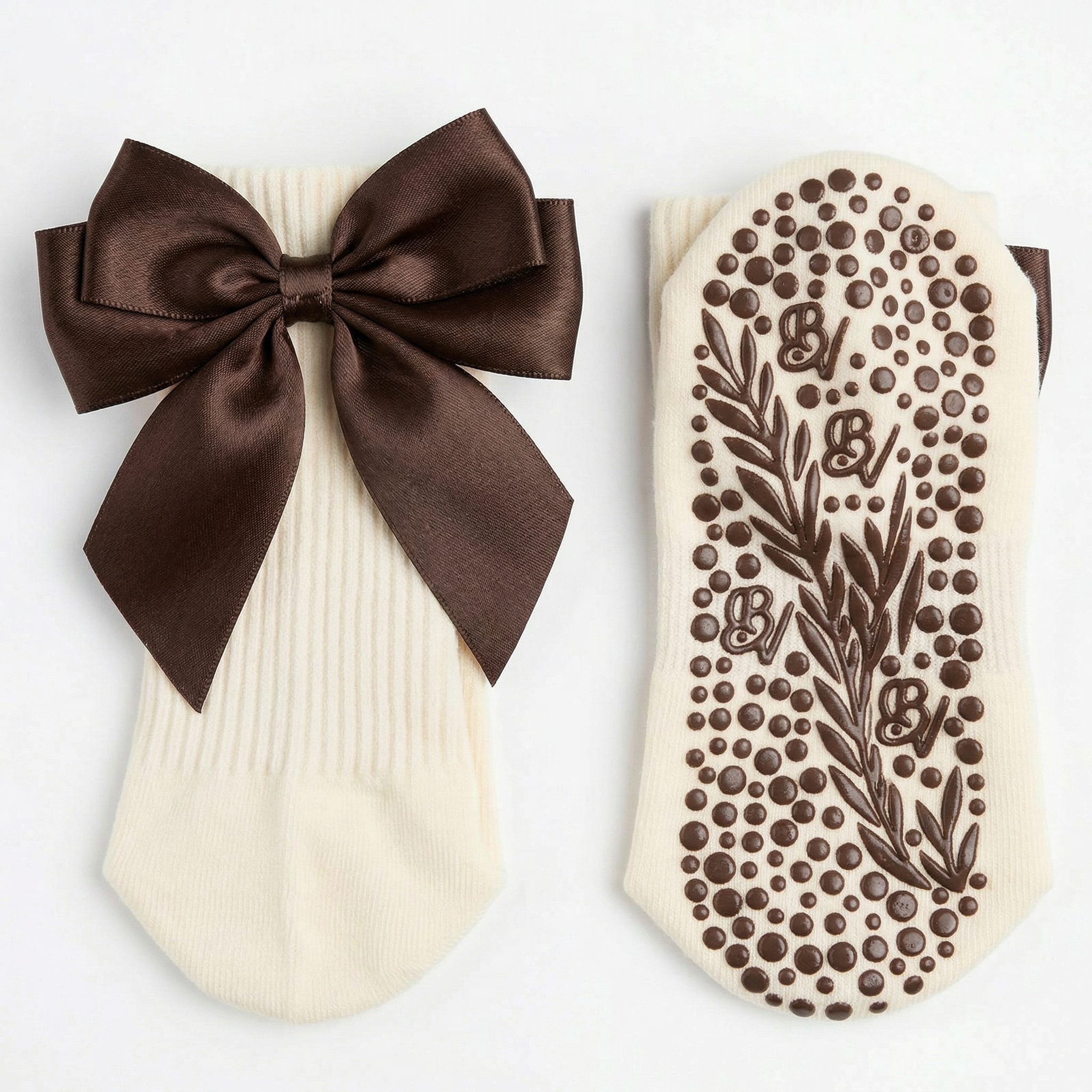 Deep brown organic cotton Pilates grip socks featuring a sophisticated minimalist ankle bow and traction-engineered dual grip lining by Bellona Velvet.